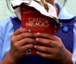 Girl with Green & Black's organic chocolate crop