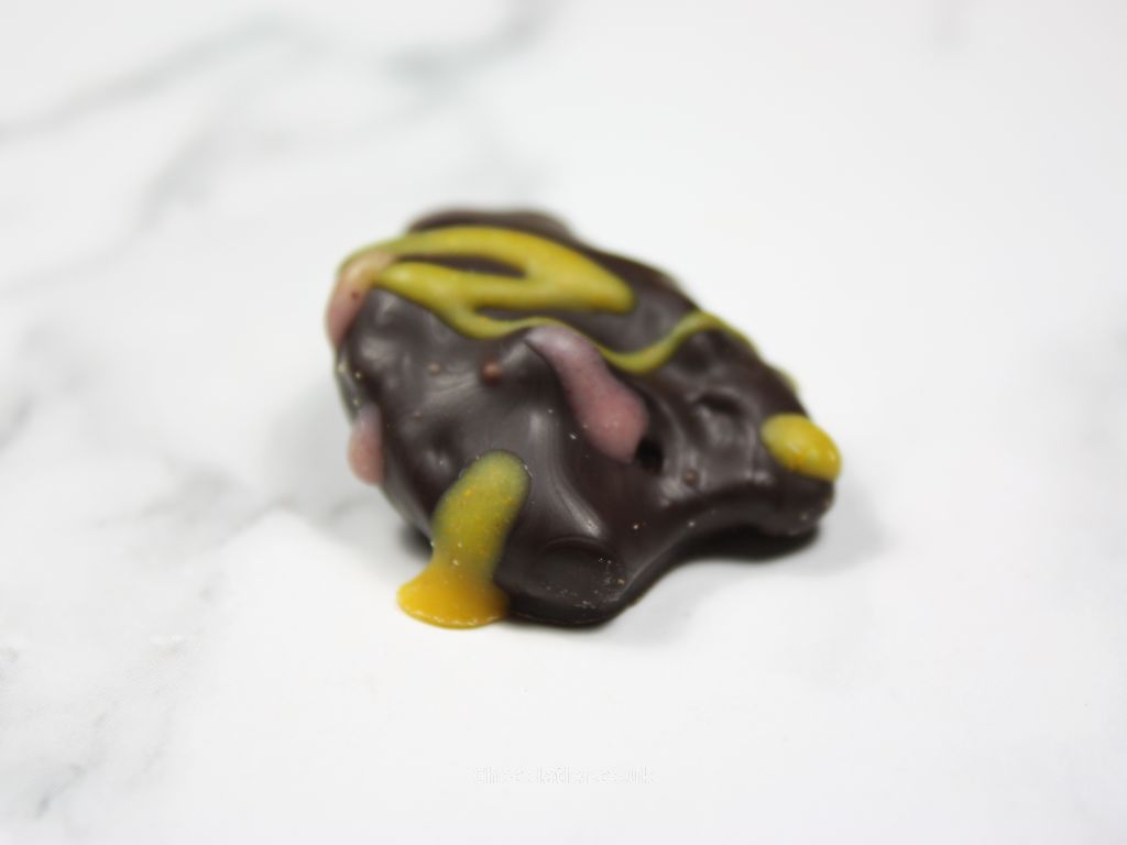 Dark Chocolate Covered Prune by Andreea