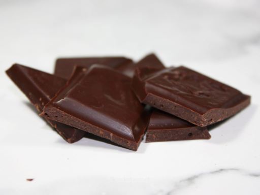 Close-up of Chocolataria Equador 68% São Tomé Dark Chocolate with Cocoa Nibs