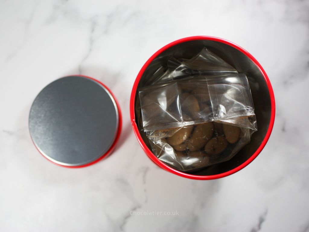 Inside the The Raw Chocolate Co Vegan Organic Spiced Chocolate Almonds Festive Tin