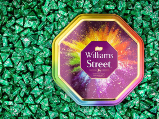 Quality Street Tin On Green Triangles