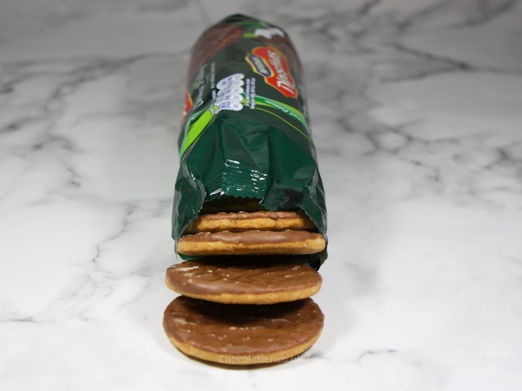 Opening the McVitie’s Christmas Pudding Milk Chocolate Digestive Biscuits pack
