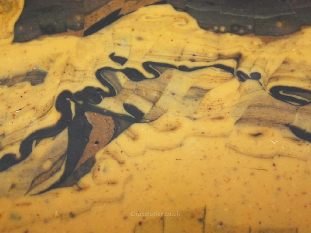 BRIK Caramel, Reishi & Sea Buckthorn Chocolate Marble Tile Closeup