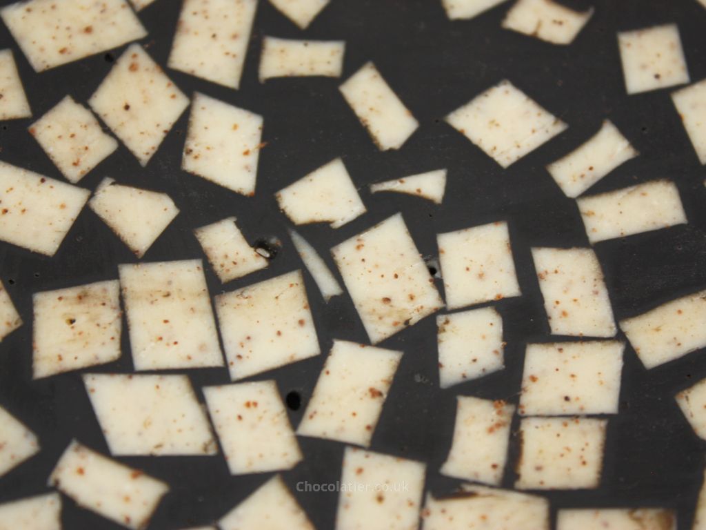 BRIK Sesame, Charcoal & Orange Chocolate Terrazzo Tile Closeup